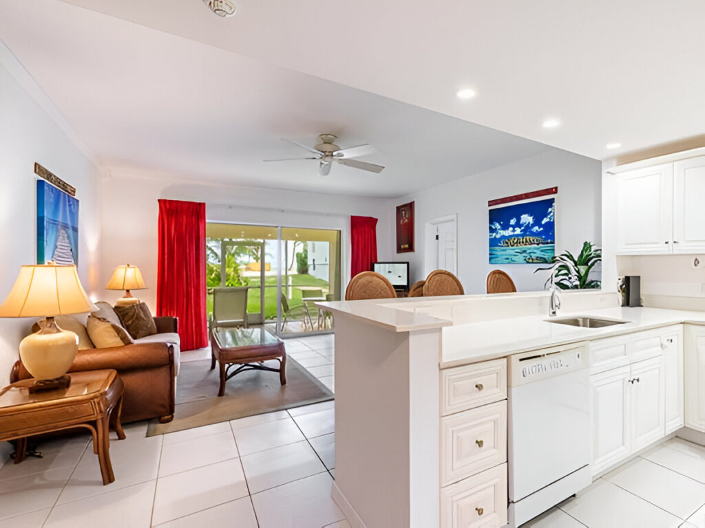 Ground floor, turn-key 1 bedroom with beach views next door to Rum Point Restaurant and Beach and 2 mins drive to Kaibo! Open plan renovated living room, kitchen, dining, leading to the private screened-in patio. One huge bedroom with a king bed. Stunning beach views in a 3 Acre Site with 675 feet of beach frontage. On site Pool, tennis court, gym, game room, two beaches, and Rum Point Club next door. The area directly in front and to the left of the Retreat is a designated and protected marine park. The snorkelling is excellent right in front of the complex. Sunsets are often enjoyed from the private beach all year round. This quieter side of the island provides peace and tranquillity. Head next door to Red Sail for motorized and non-motorized water sport options or excursions to Stingray city or scuba diving when you are ready for some action.